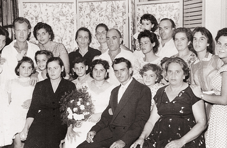The wedding of "orphan" Rosa Belleli, who was saved on Ereikoussa. Sitting next to her (in a black dress) is Nina, who raised her. Standing above the bride (also in black) is Amir's grandmother, who was also named Rosa Belleli