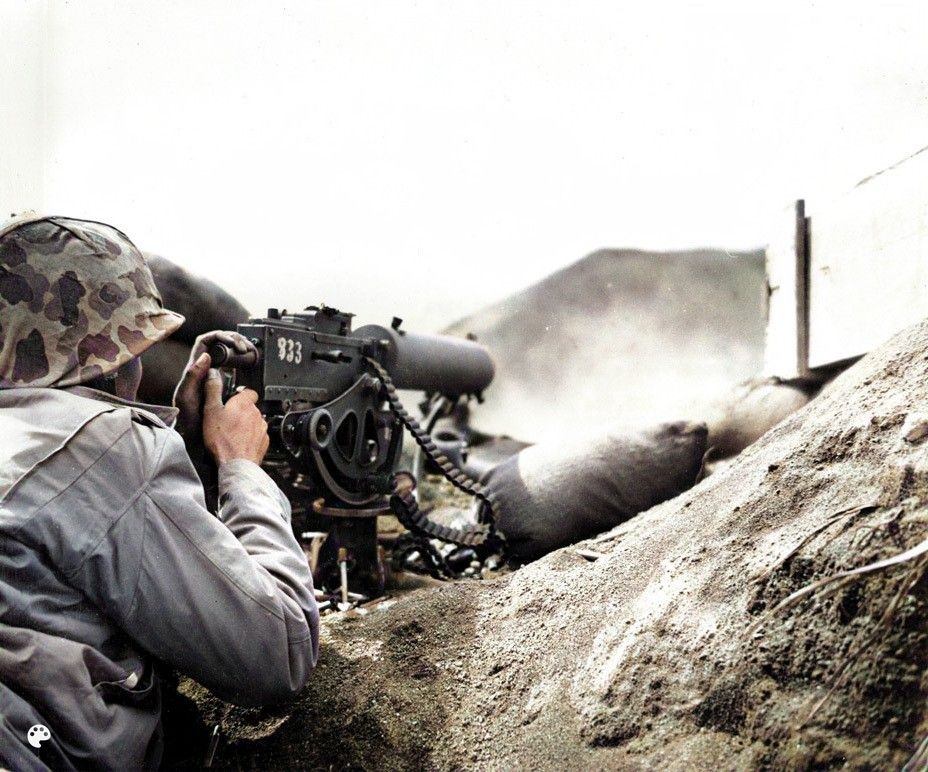 A US Marine fires a machine gun