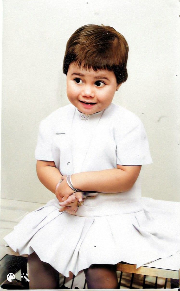 Alejandra a los 3 años, foto mejorada y coloreada en MyHeritage.