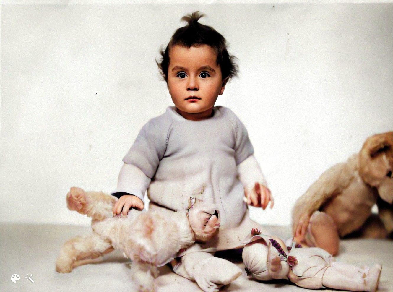 Alice as a baby. Photo enhanced and colorized by MyHeritage