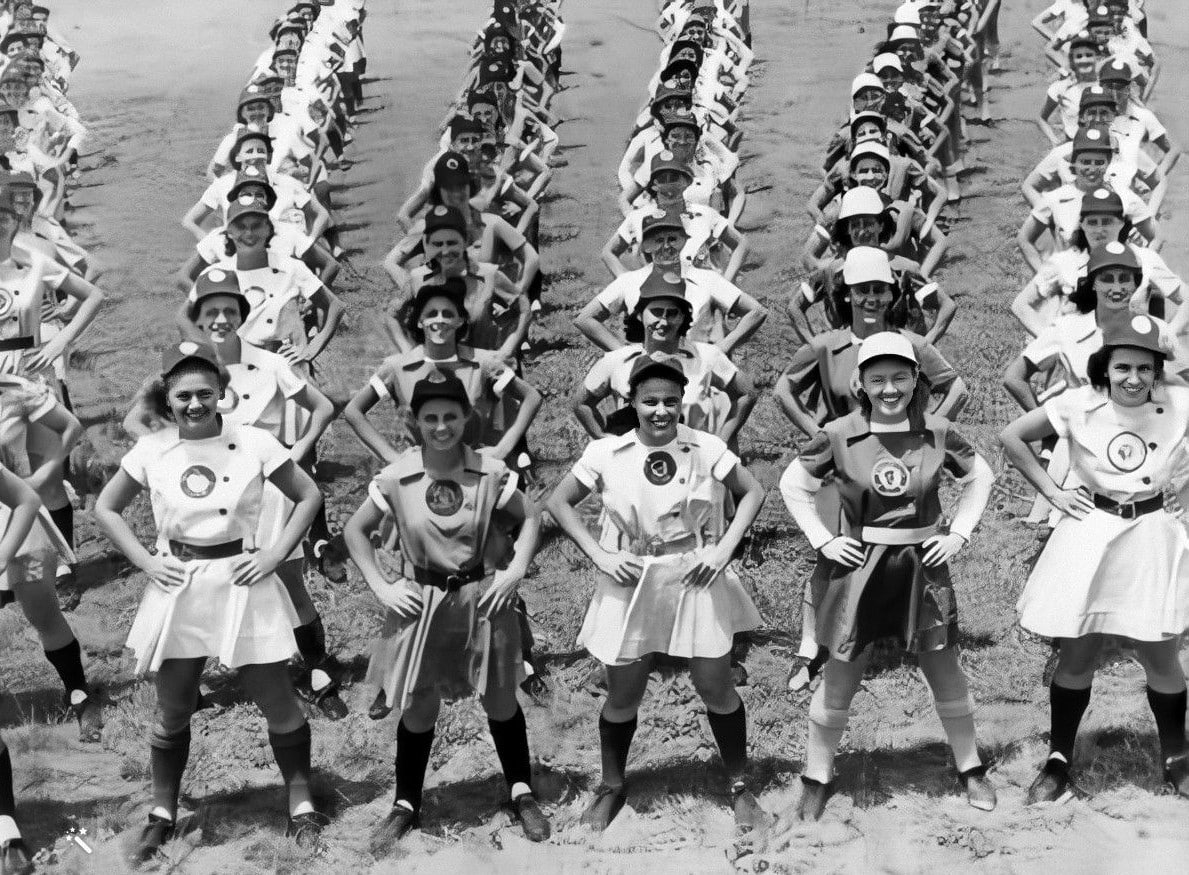 AAGPBL players performing calisthenics. Photo enhanced by MyHeritage