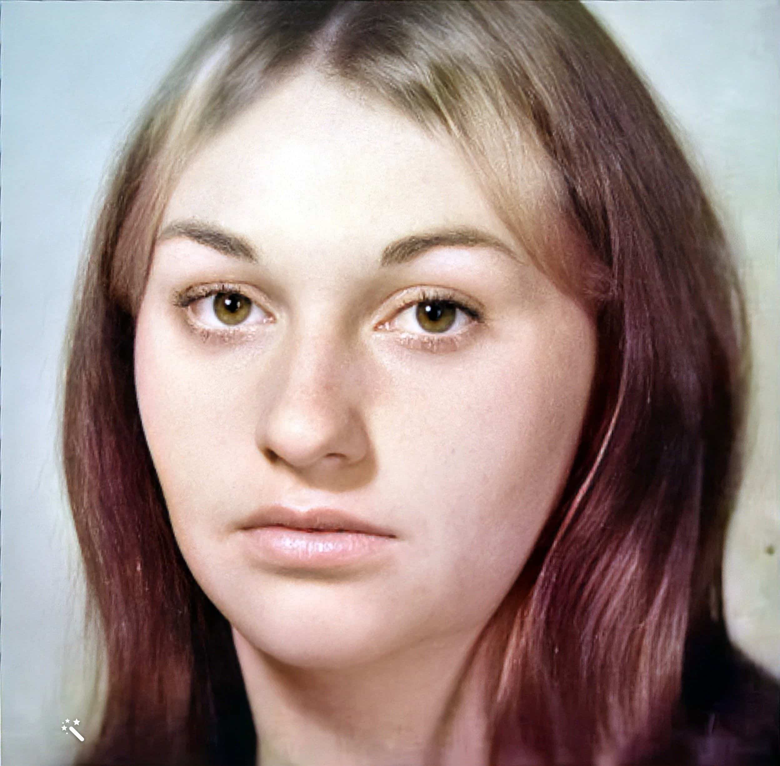 Angela at 18. Photo enhanced and colors restored by MyHeritage