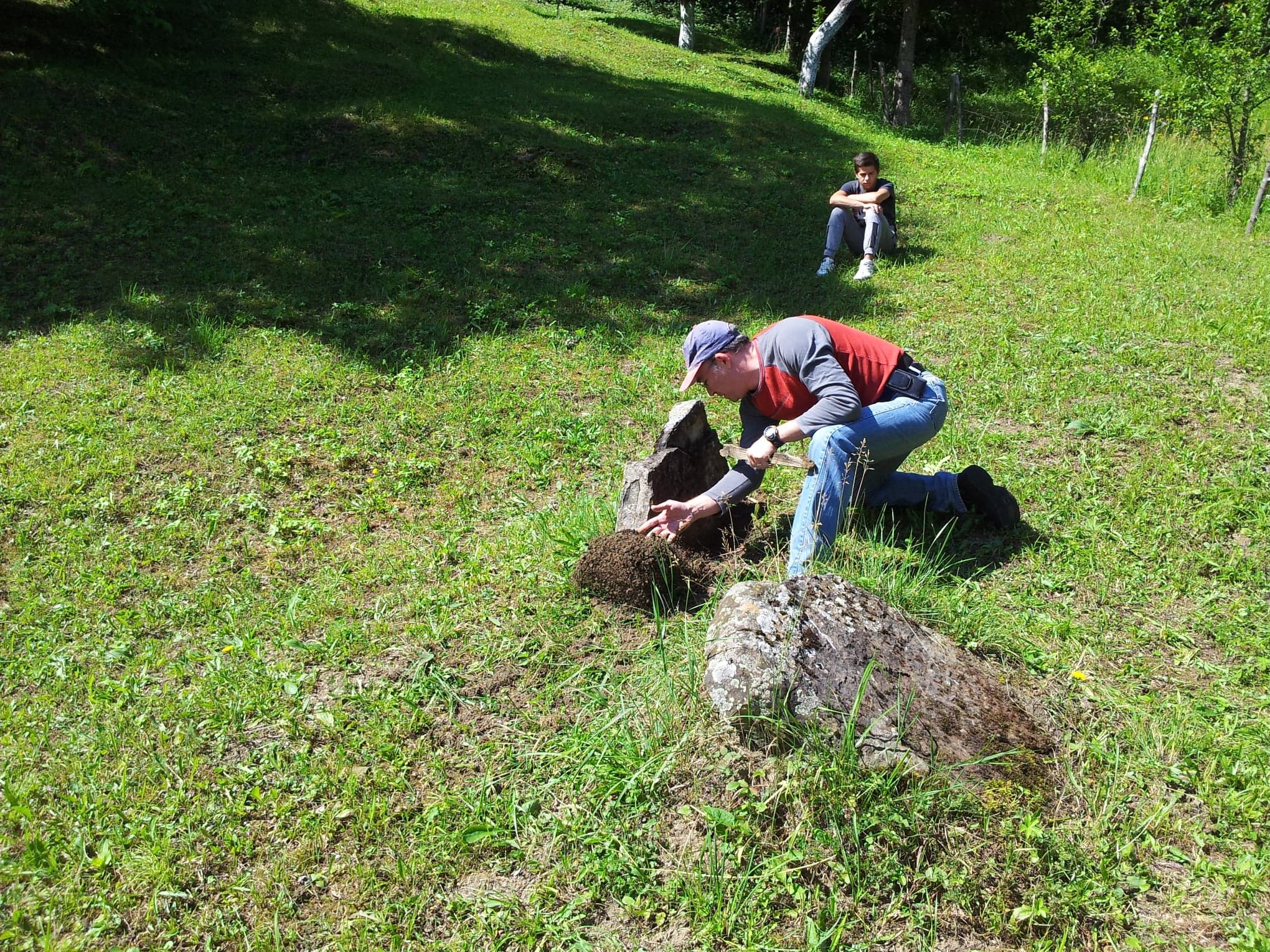Digging up a forgotten tombstone in Borsa, Romania