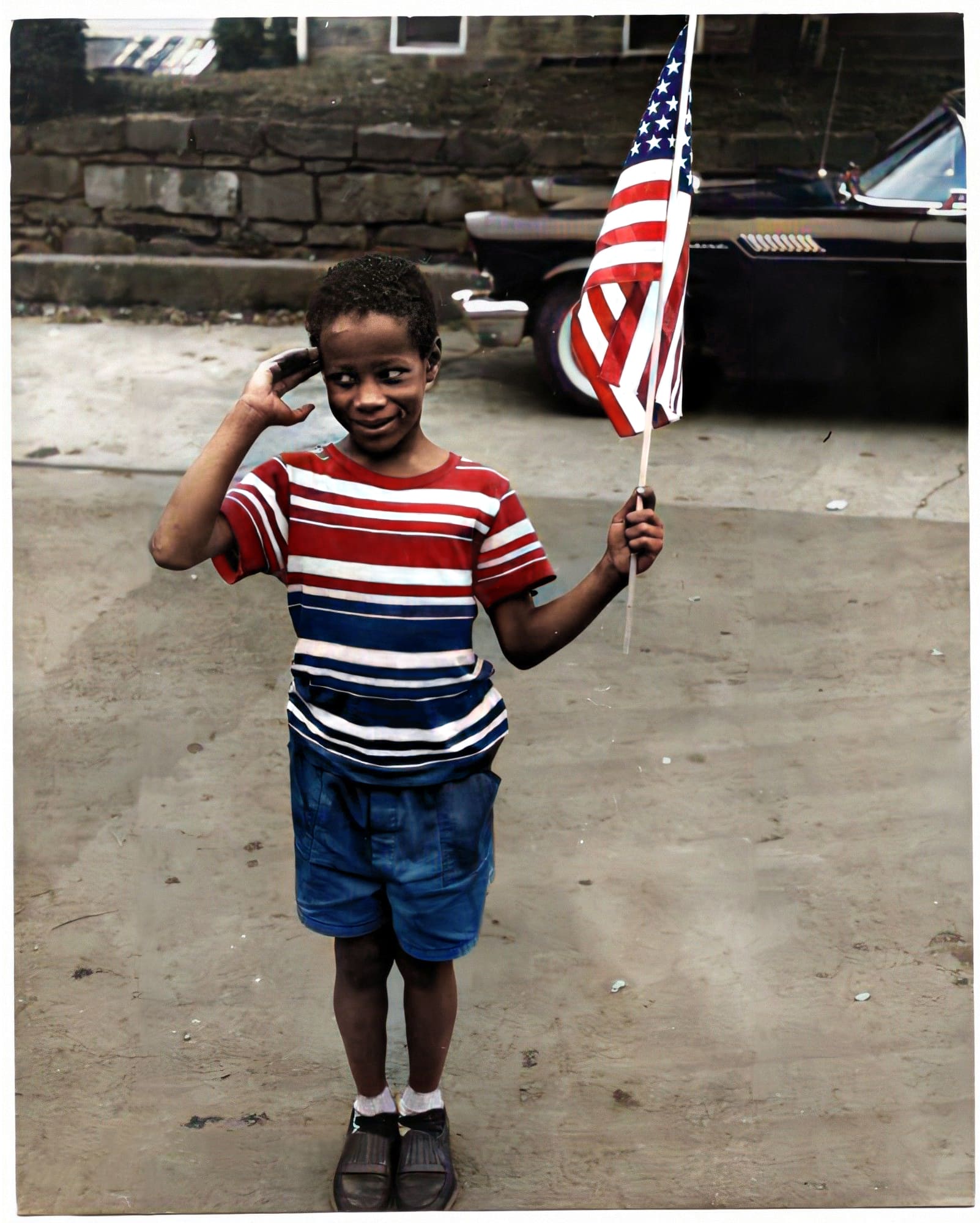 Boy holding an American flag, Morgantown, West Virginia, 1961. Courtesy of West Virginia University