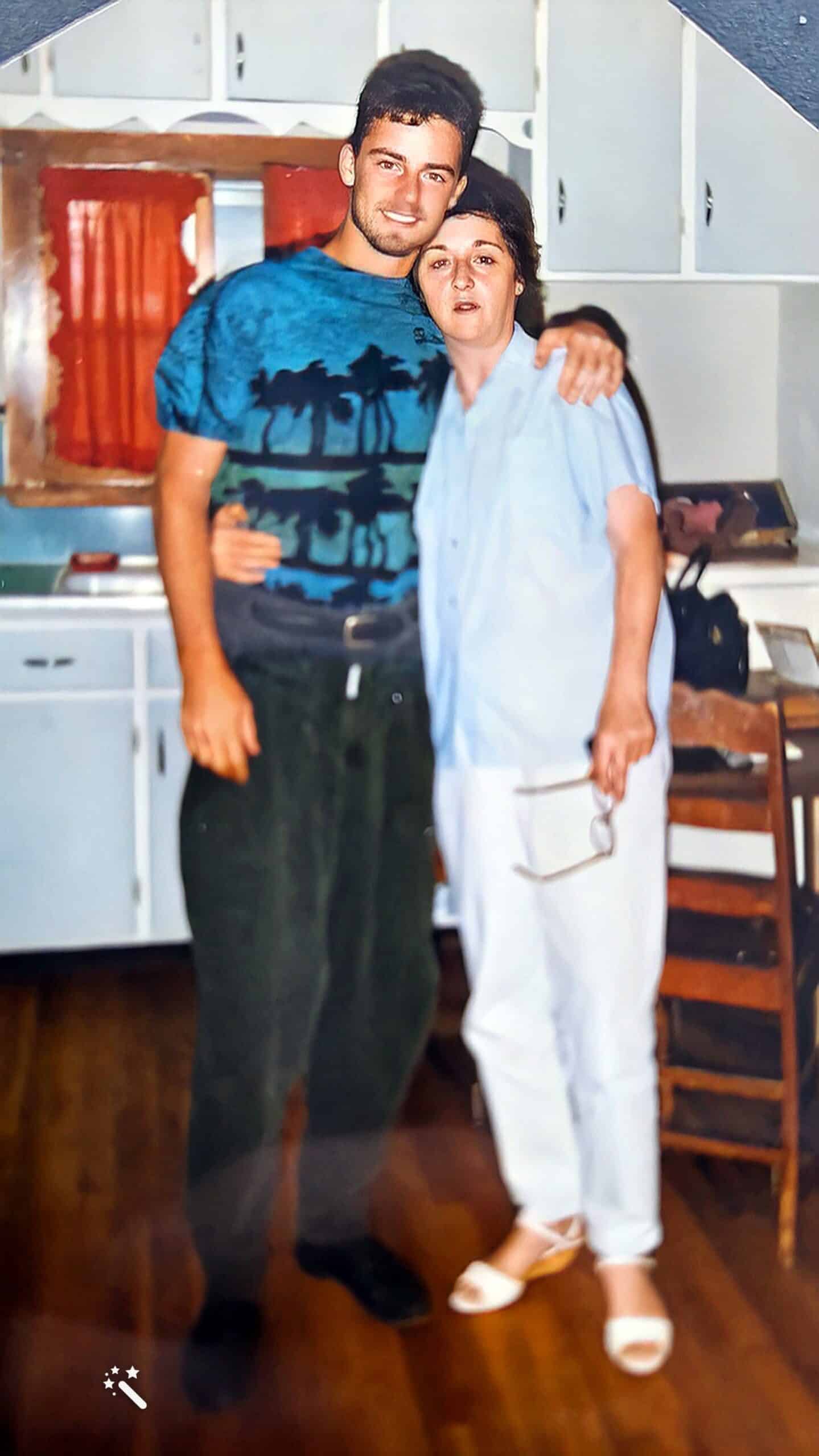 Carl and Viola, his biological mother. Photo enhanced and colors restored by MyHeritage