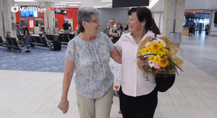 Reunited: Collette meets her sister, Yvette, and her family for the first time.