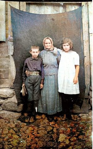Photo of woman with two children