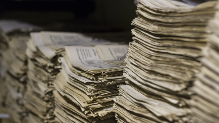 What Hidden Clues Can Obituaries and Newspaper Archives Provide?