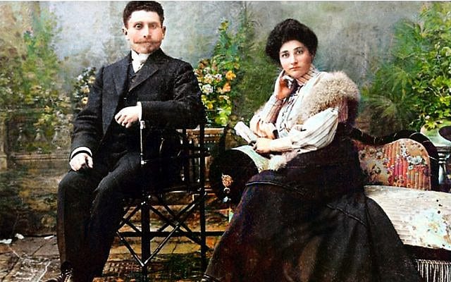 Old photo of man and woman, seated