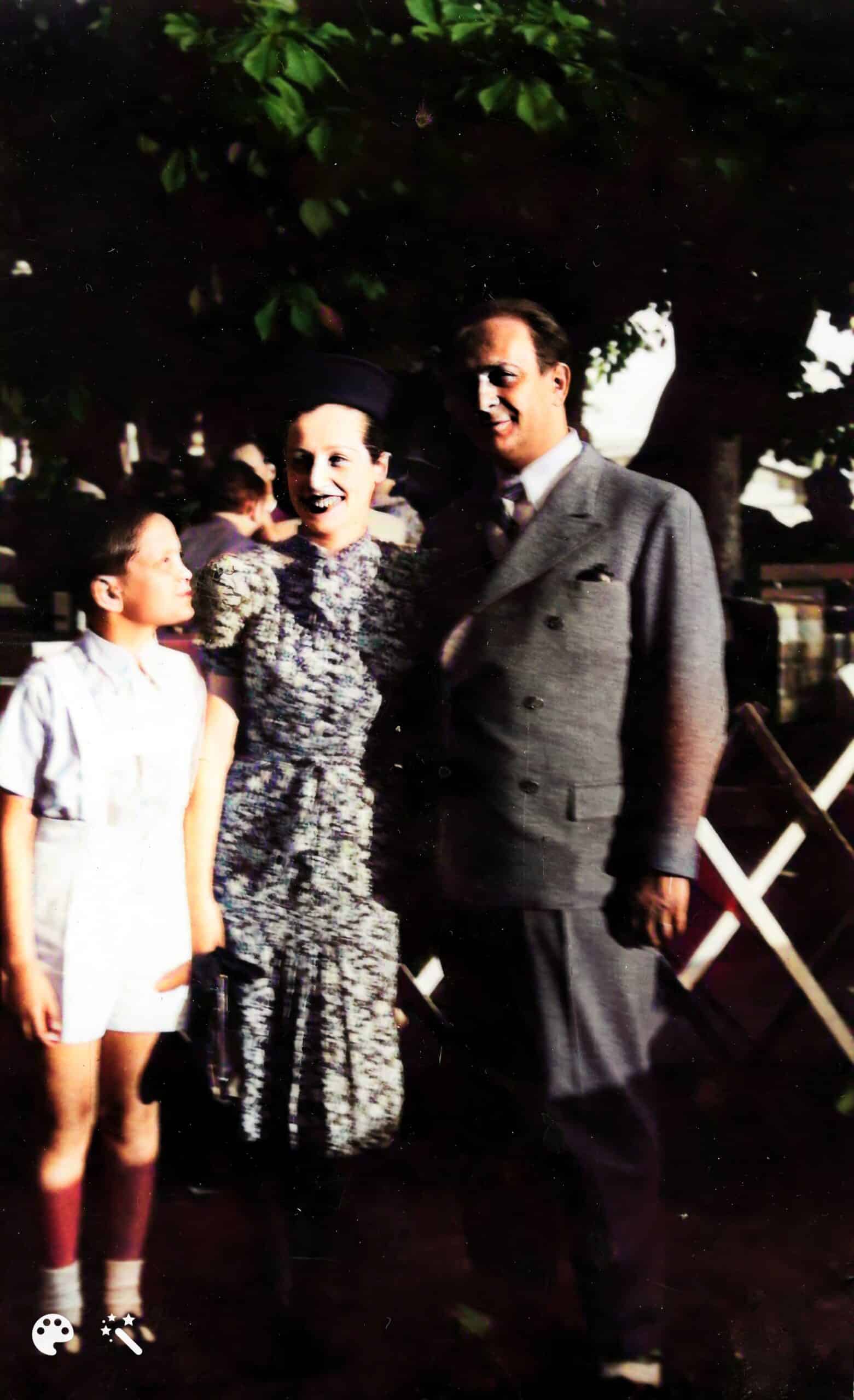 Rene as a boy with his father and stepmother, Alice's parents. Photo enhanced and colorized by MyHeritage