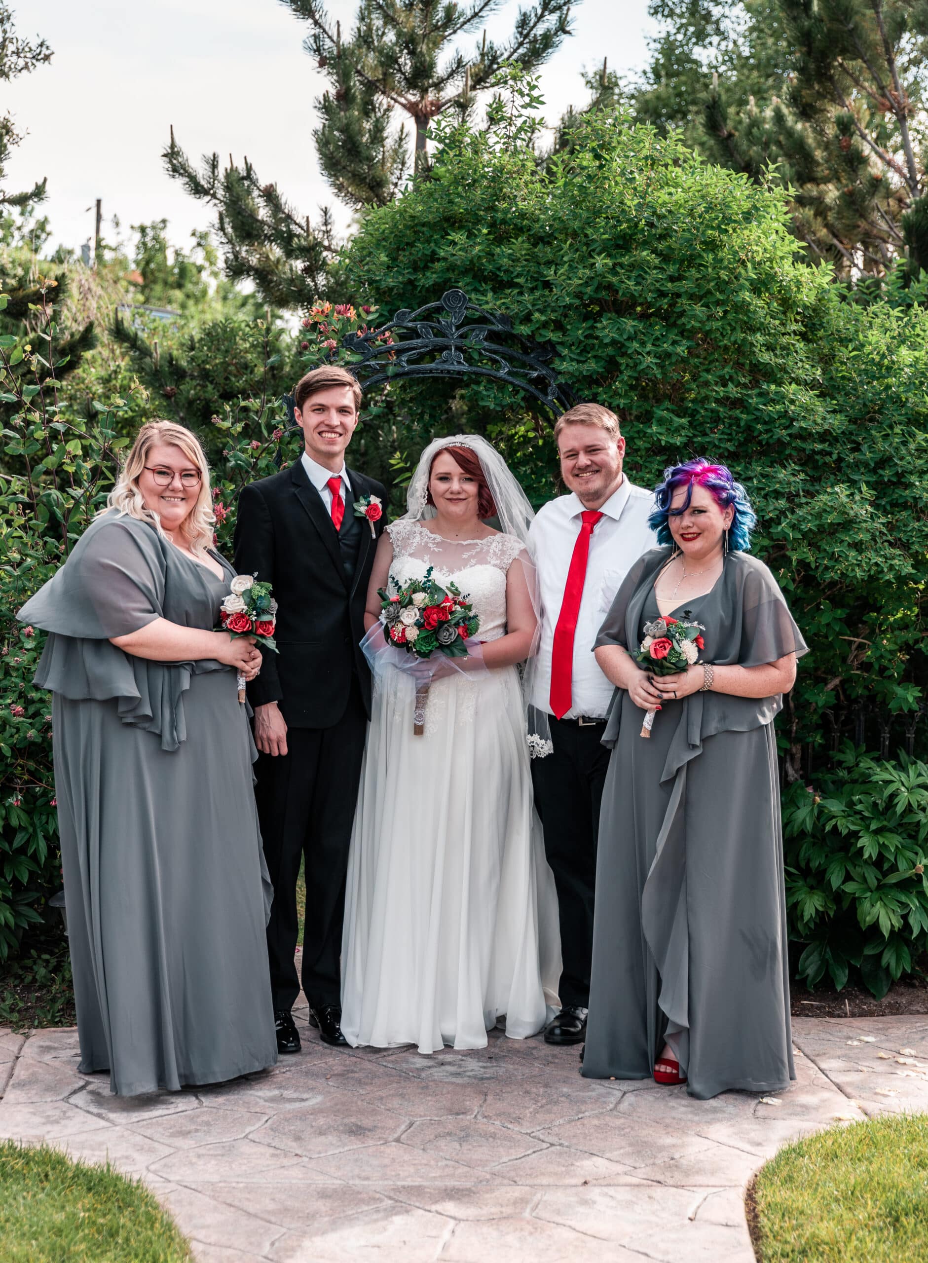 Rachael (right), at Caitlin and Evan’s wedding (center) with her half-siblings Spencer and Chrissy