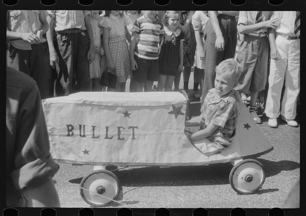A little boy participates in a soapbox auto race with his vehicle, ‘Bullet,’ in Salisbury, Maryland, during the July 4 celebrations in 1940. Courtesy of the Library of Congress
