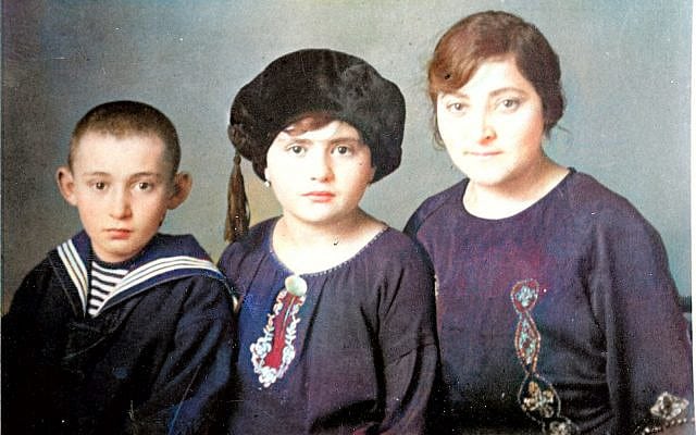 Photo of woman, girl, and boy