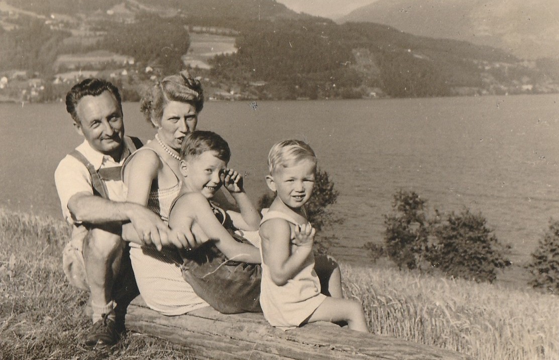 Viktor with his brother and parents in 1953. Photo colorized and enhanced by MyHeritage