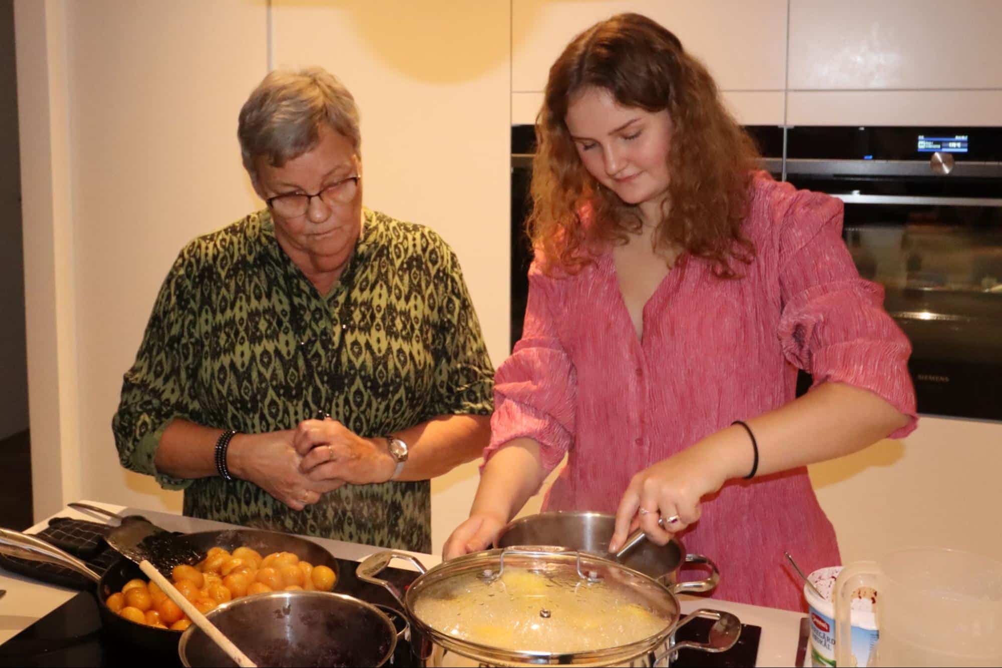 Anne and Emilie preparing Christmas dinner together this year