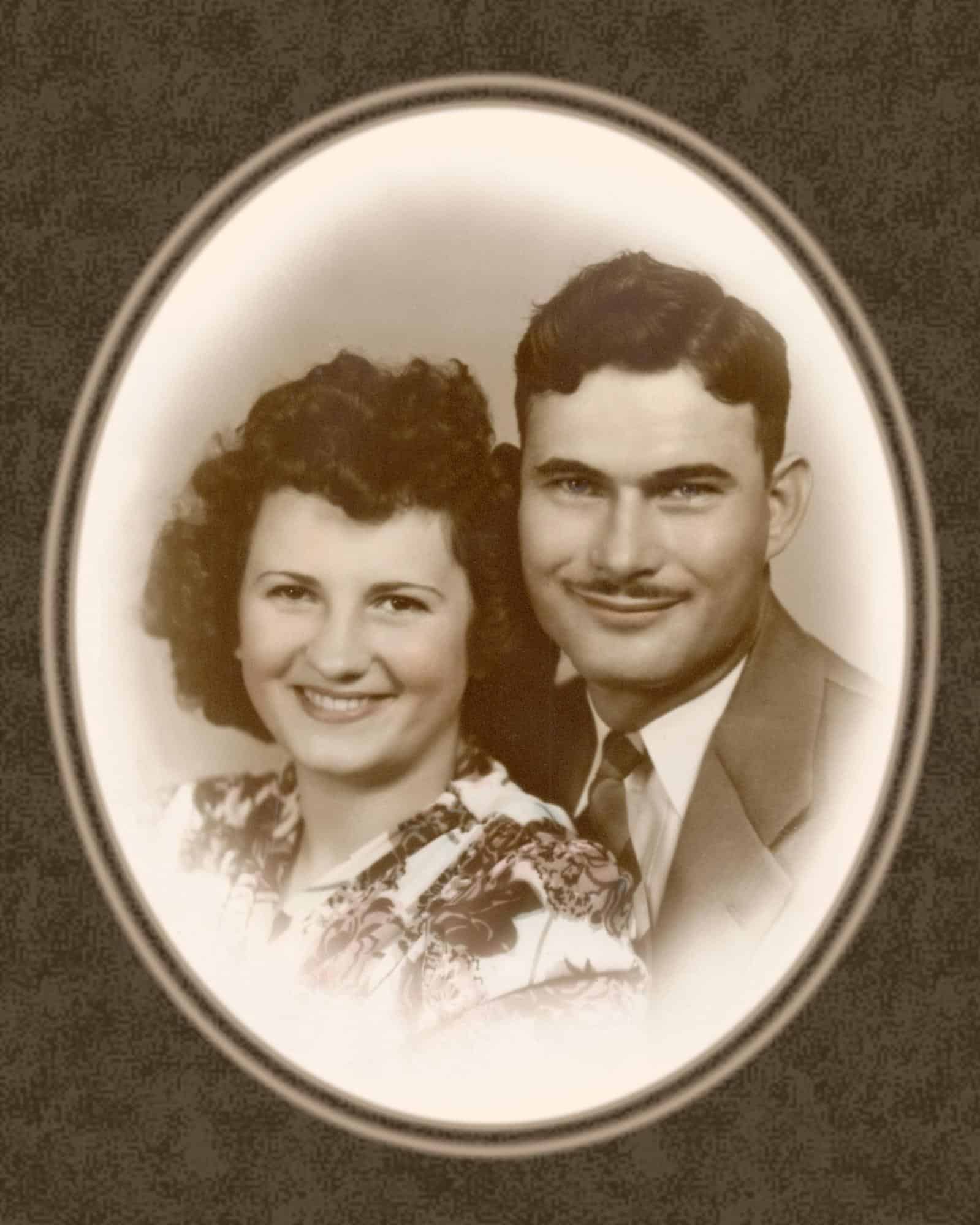Black and white photo of young smiling couple