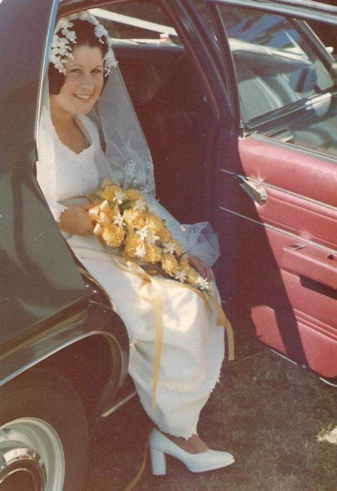 Photo of woman in wedding gown
