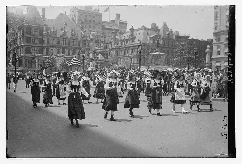 The 4th of July parade on 5th Avenue, NYC in 1918, with French-American girls leading the French Division. Courtesy of the Library of Congress