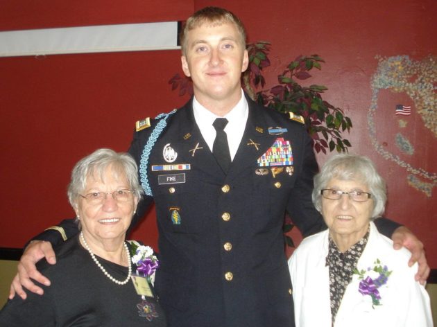 Capt. Zachariah Fike helped reunite sisters Adeline Rockko (left) and Mary Piccoli with the Purple Heart medal of their late brother, Army Pvt. Corrado Piccoli.